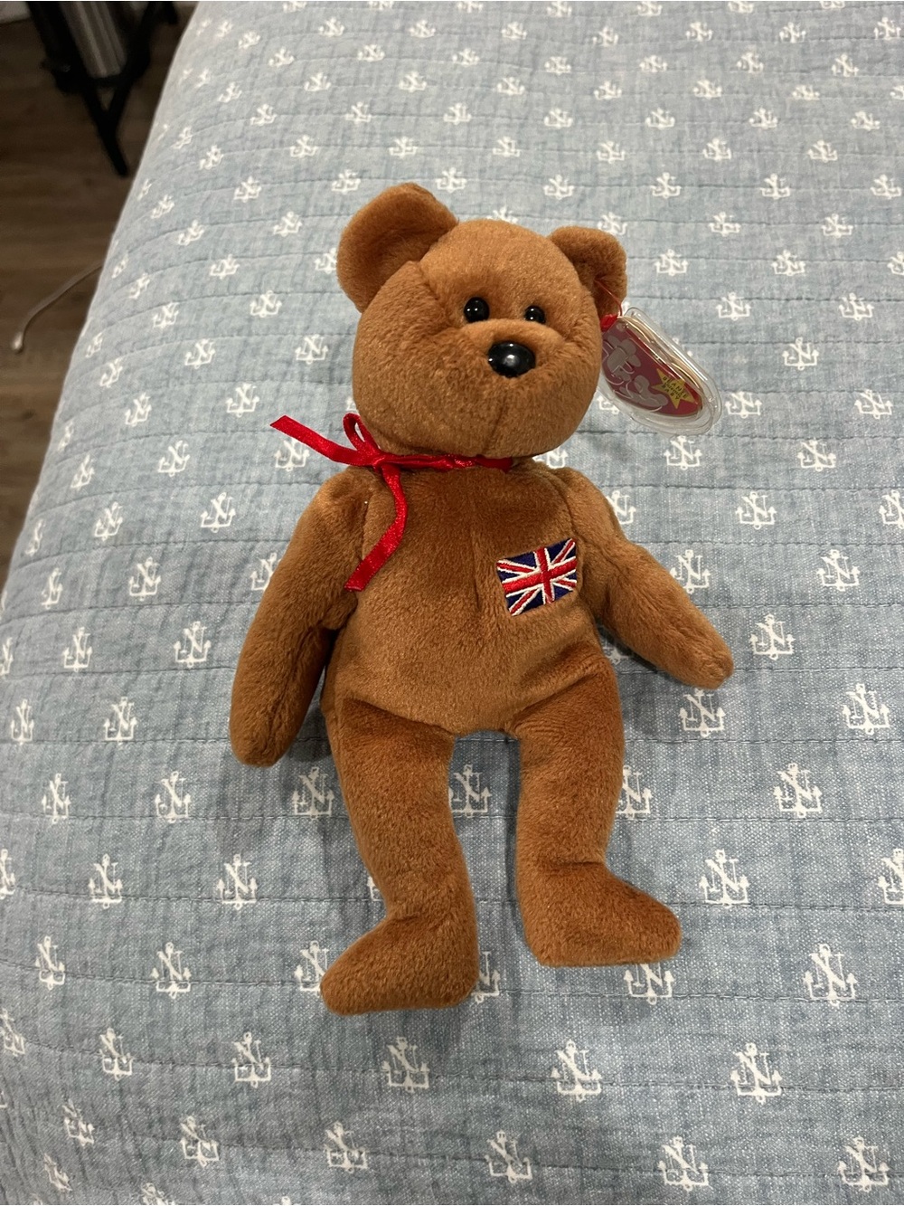 Brown Plush Bear with Union Jack Patch and Red Ribbon